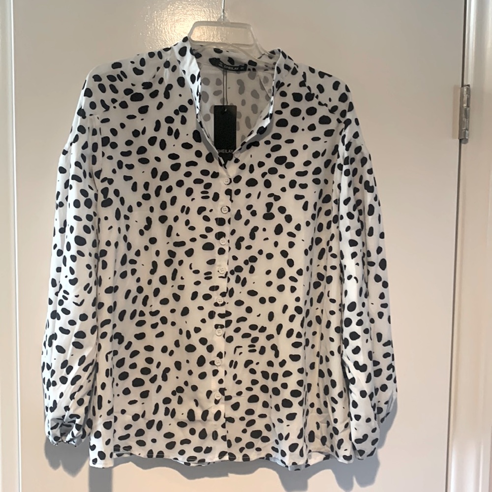 Animal print white and black size small balloon sleeve style button down blouse